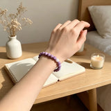 Bracelet en perles de pierre violette striée, mixte